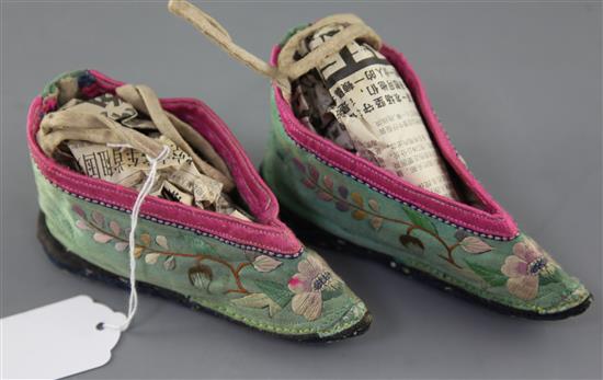 Four pairs of Chinese embroidered silk ladys shoes, late Qing dynasty